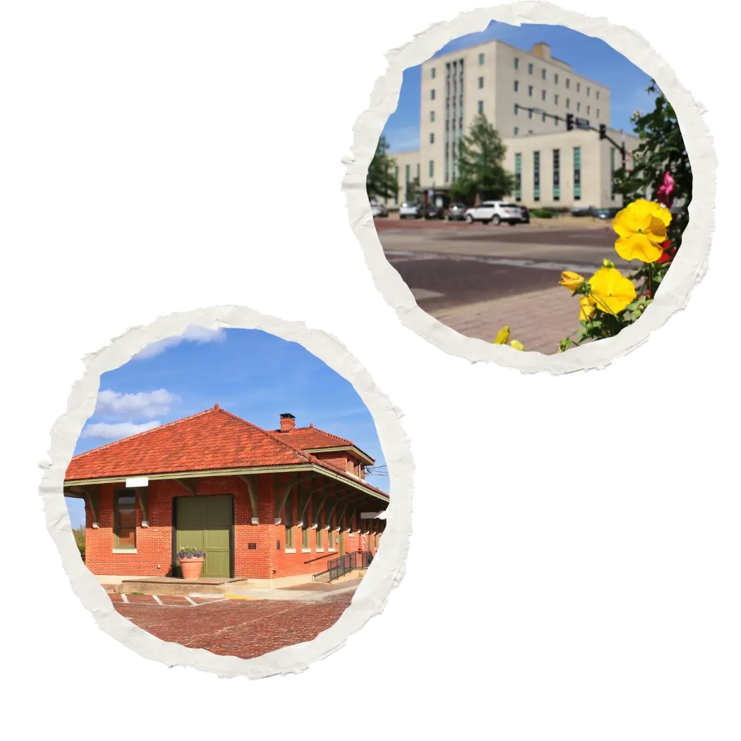 Two historic buildings in Tyler, TX, one a brick train depot with a red roof, the other a tall stone building, representing the blend of history and progress in the city where business coaches thrive.